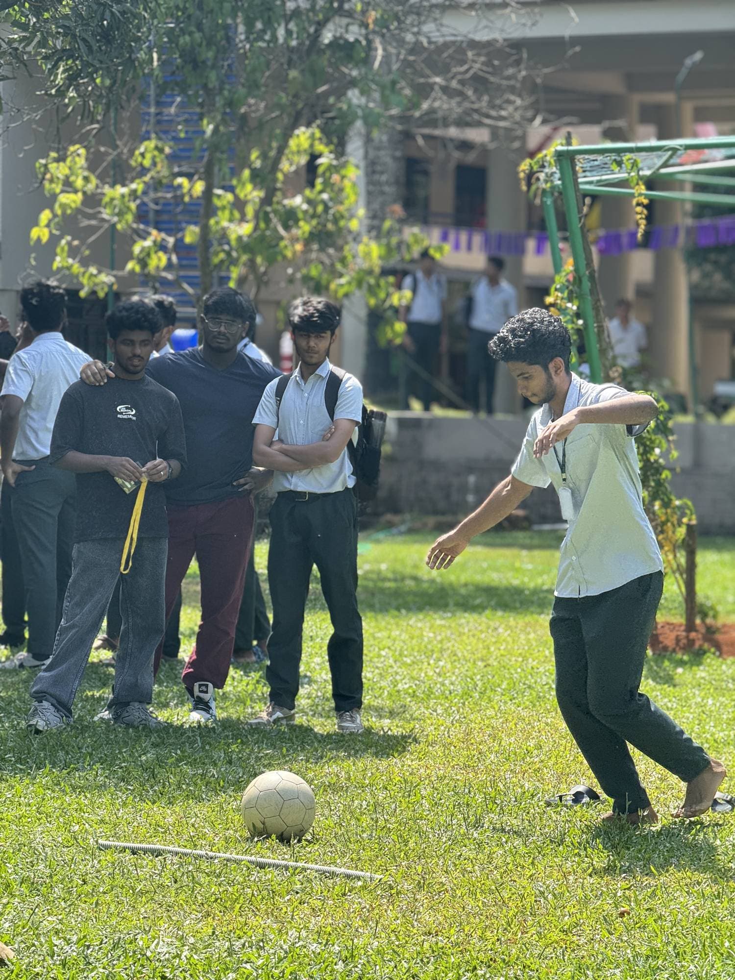 Students playing a ball game outdoors during Edge Plus